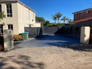 DRIVEWAY PARKING - Fence painted, driveway concreted - nearly done.