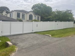 PVC fence with sliding gate