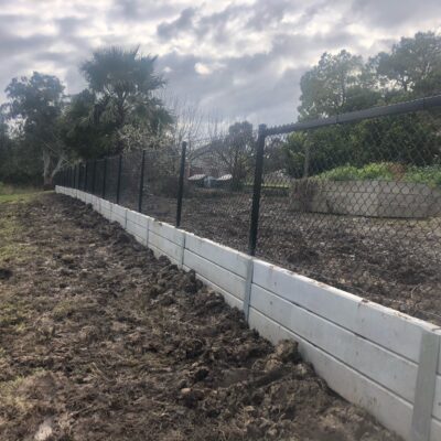 Mesh Fencing above retaining wall