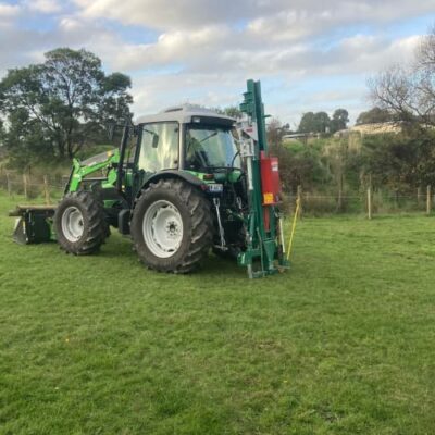 Tractor with post driver, thumping in posts in Narre Warren North