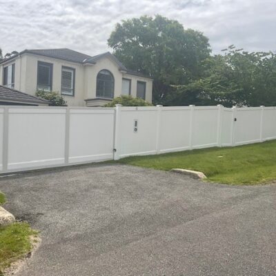 PVC fence with sliding gate